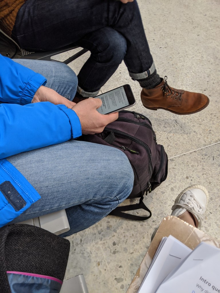 Guerrilla user research with members of the public at a train station in central London