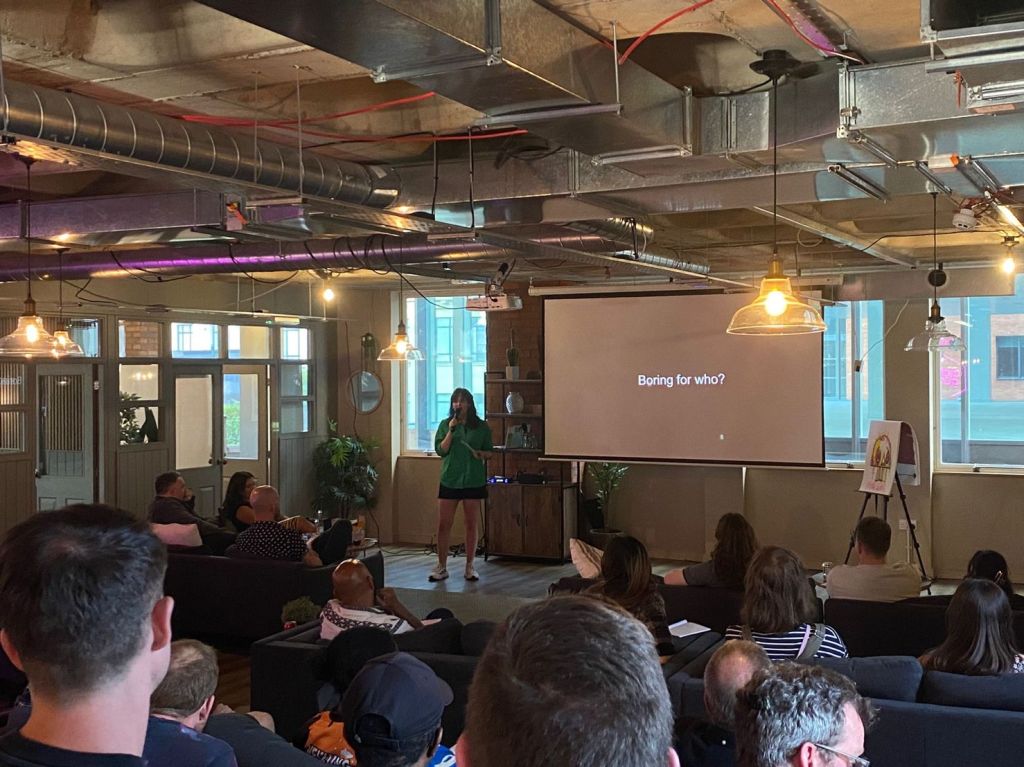 Design leader Becky Colley speaking at a UX event in Manchester