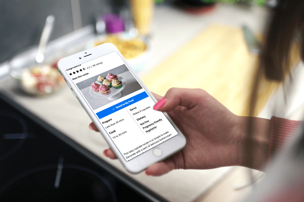 Person looking at a BBC Food cupcake recipe on a mobile phone